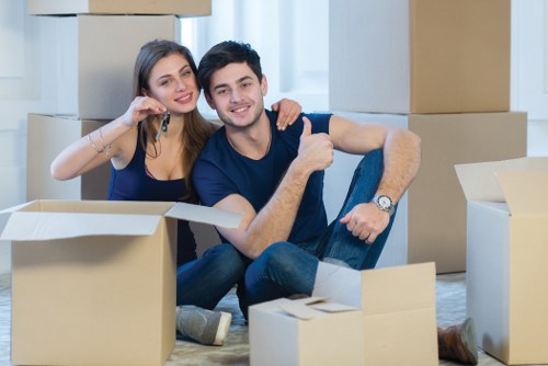 Removal team planning a house move in Mortlake with boxes and furniture