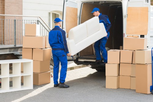 Removal van loading outside a Mortlake property