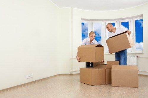 Office furniture and boxes prepared for a Mortlake commercial move